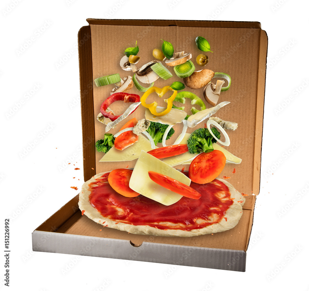 Flying ingredients with pizza dough in paper box, isolated on white background