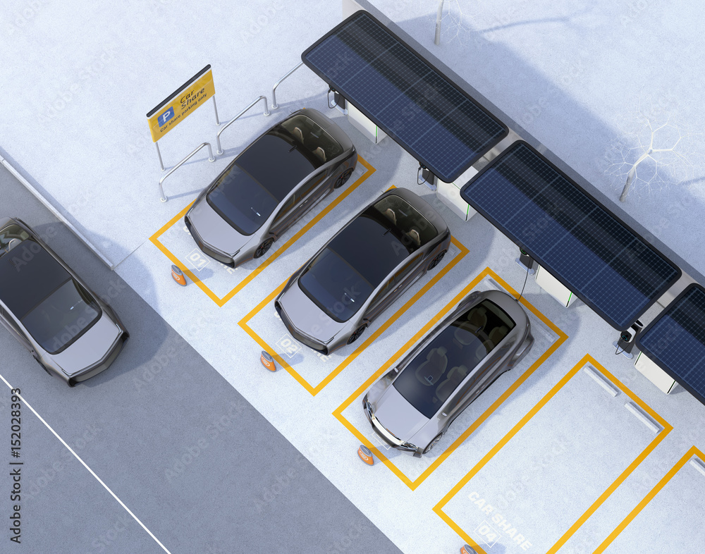 Aerial view of parking lot for car sharing business. Electric cars charging at charging station and 