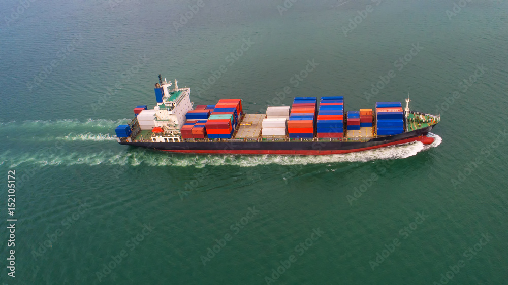 container ship in import export and business logistic.By crane ,Trade Port , Shipping, cargo to harb