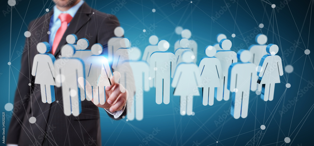 Businessman touching 3D rendering group of people with his finger