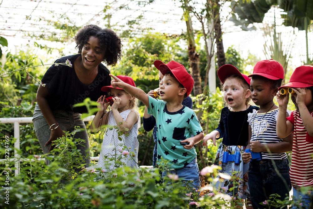 Teacher and kids school learning ecology gardening