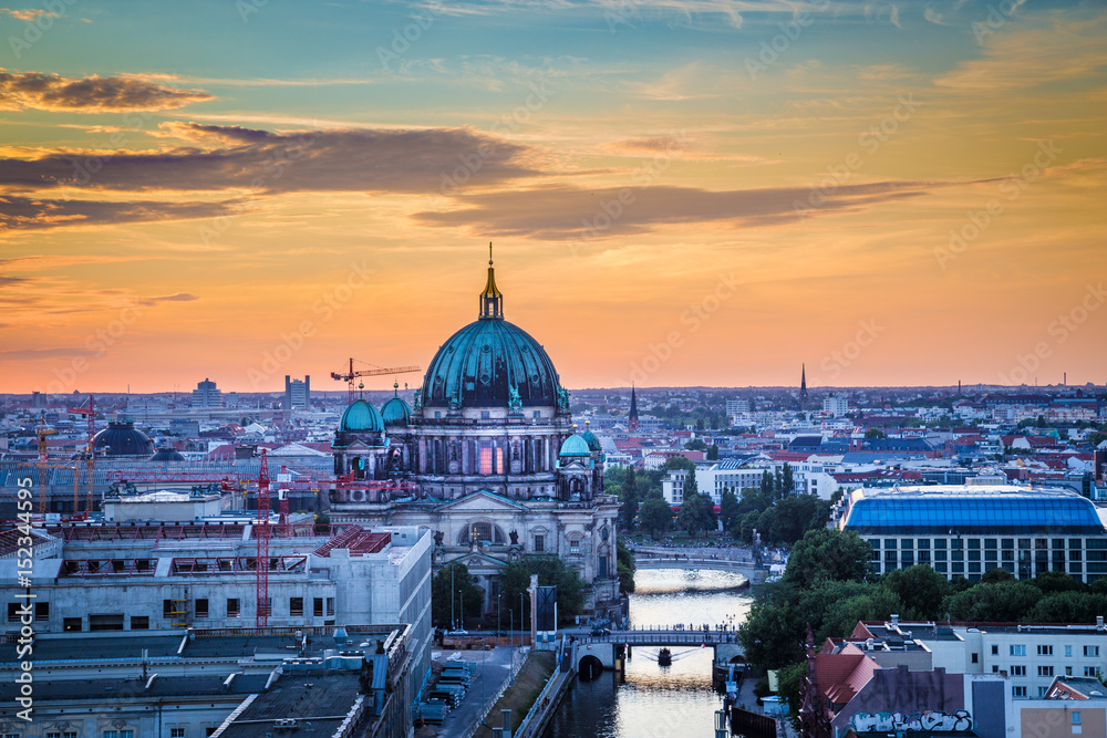 Berlin rooftops view with Berlin Cathedral and Spree river at sunset, Germany