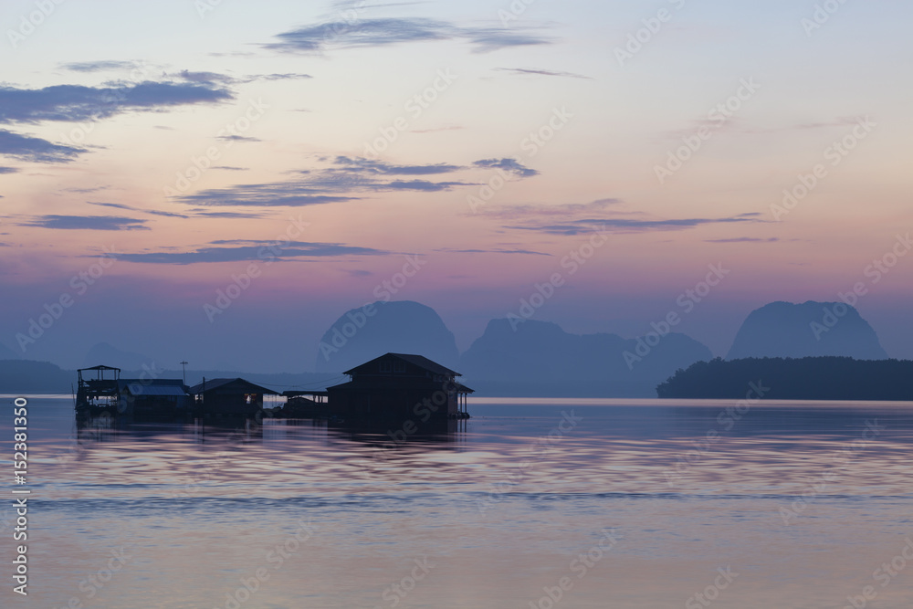 Beautiful morning sunrise over sea and mountain in phang - nga thailand.