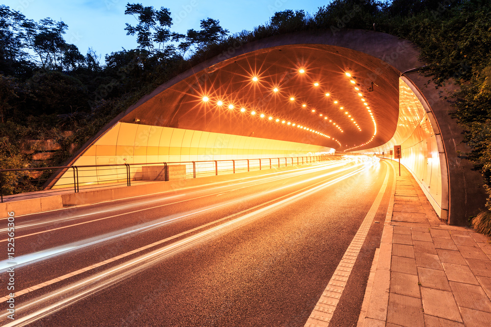 highway road tunnel exit at night