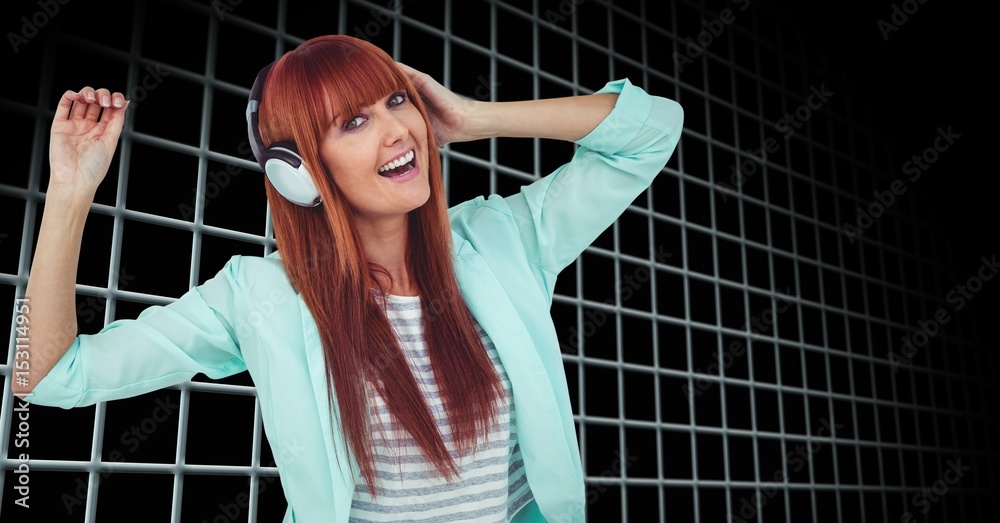 Woman enjoying music on headphones