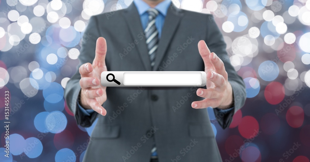 Midsection of businessman holding search bar over bokeh