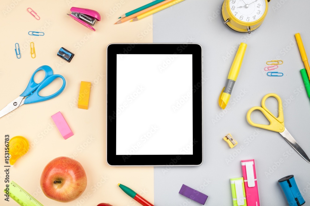 School and office supplies on tablet.