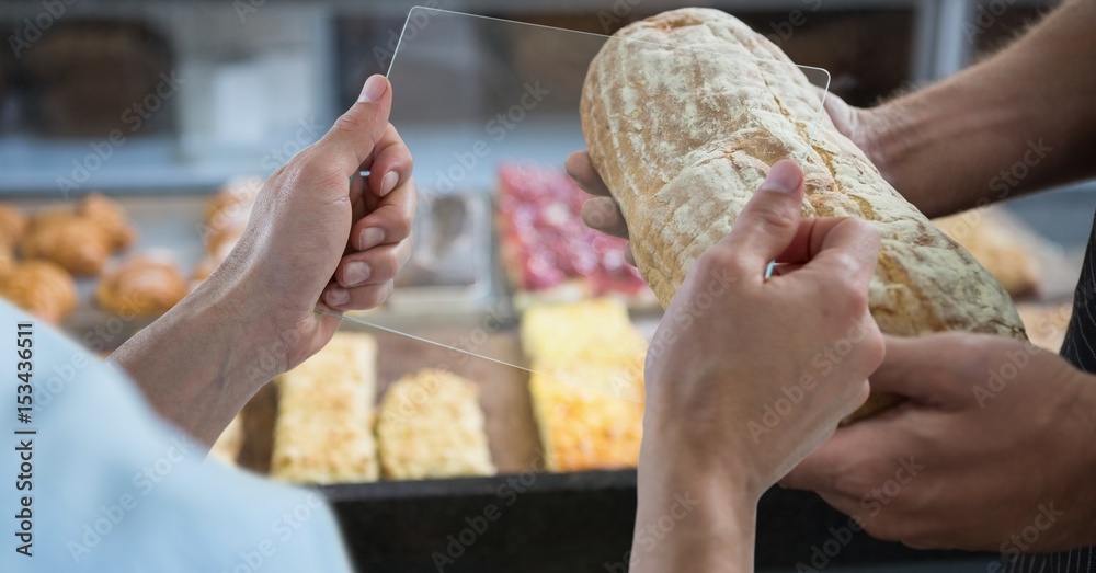 Hands photographing bread through transparent 