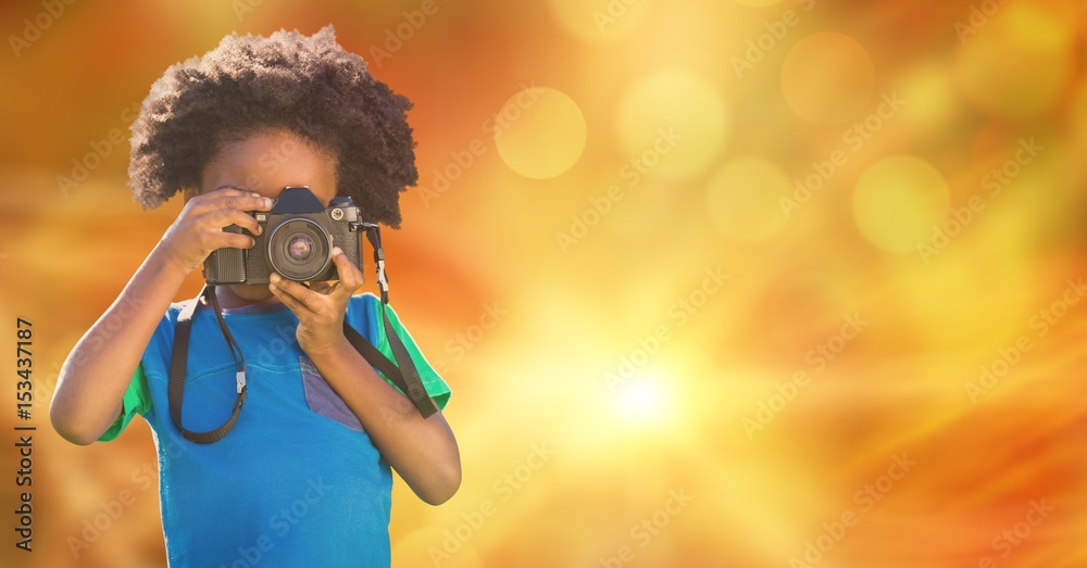 Child photographing over blur background