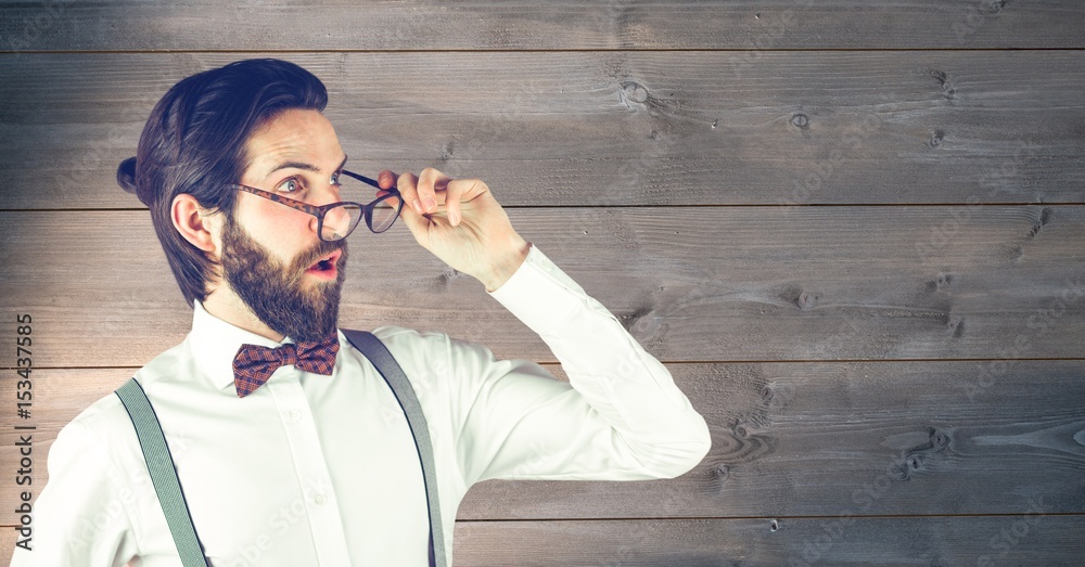 Shocked hipster wearing eyeglasses 