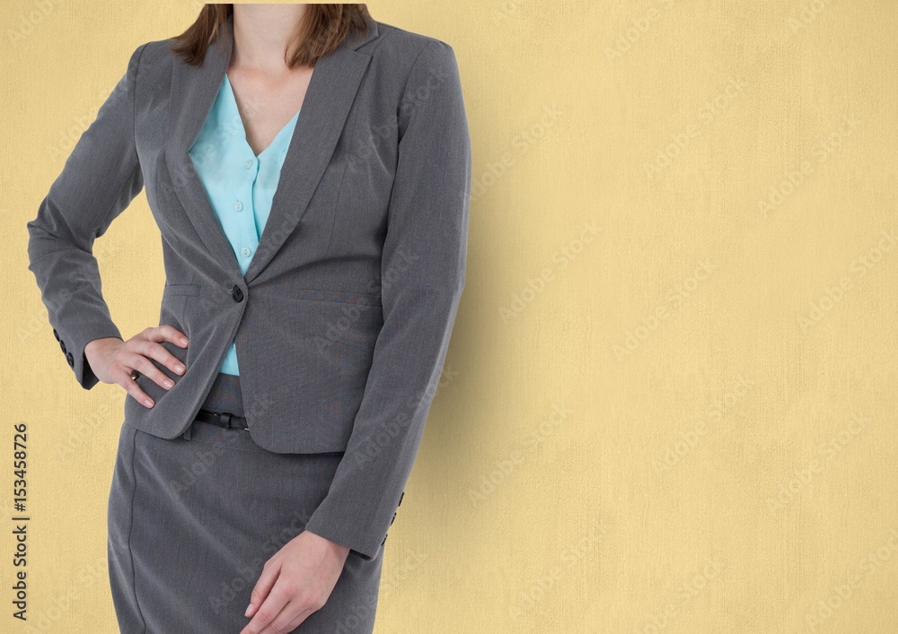 businesswoman standing with hand on hip