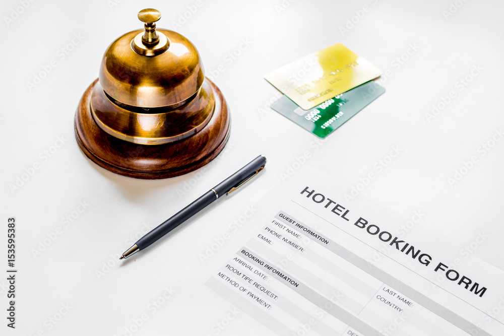 reservation form on hotel reception desk background