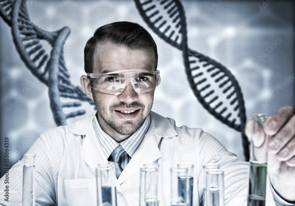 Young scientist mixing reagents in glass flask in clinical laboratory