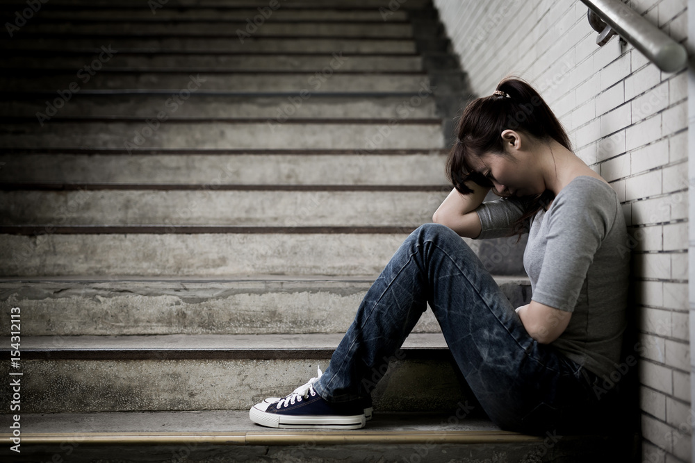 depressed woman in underground