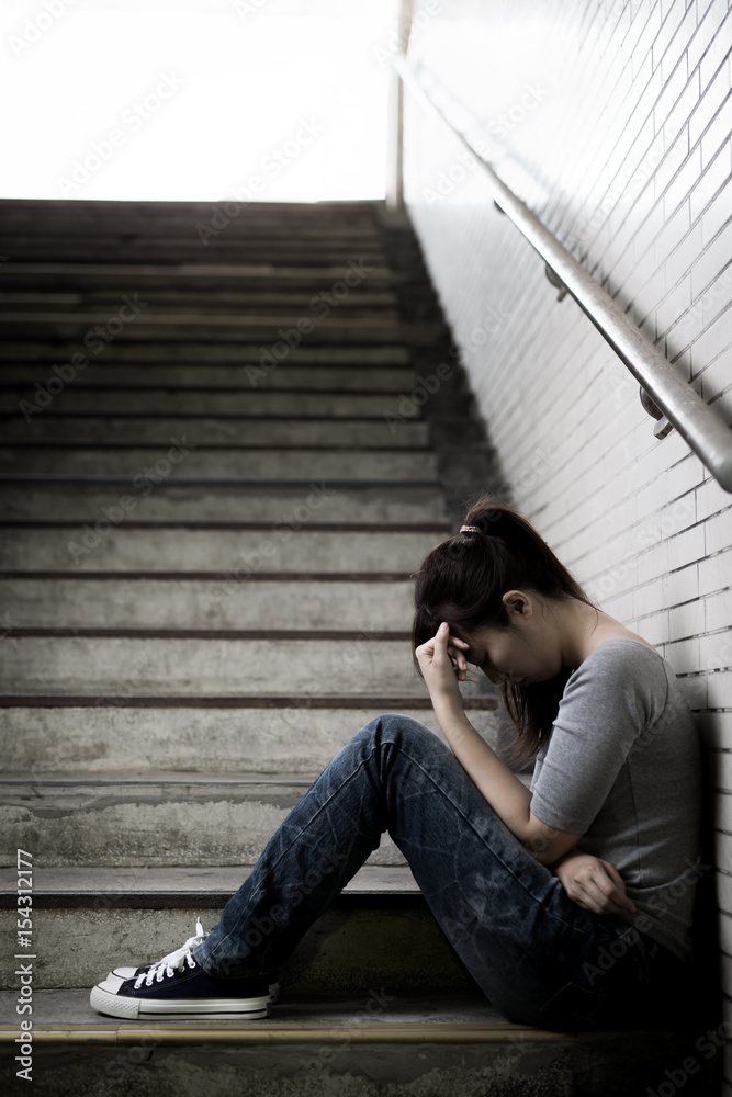 depressed woman in underground