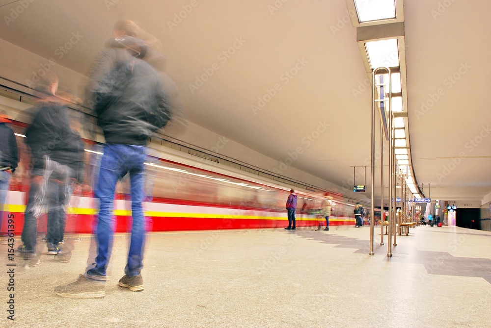 train fast moving at subway station