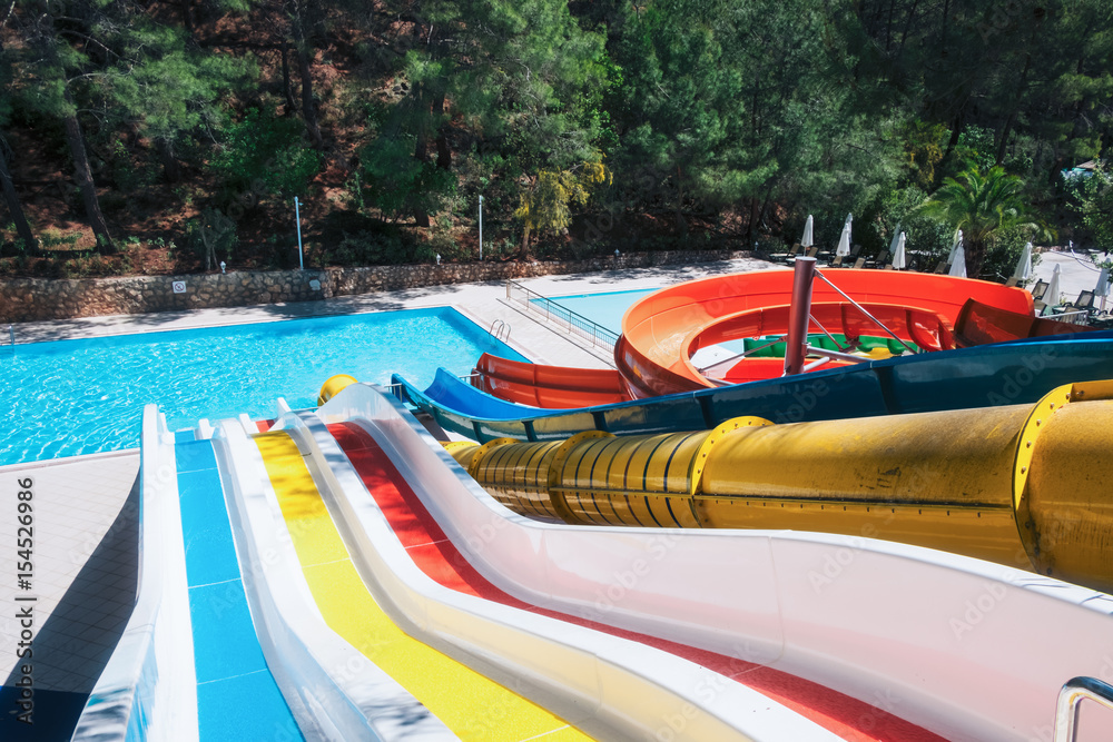 colorful aquapark in green forest