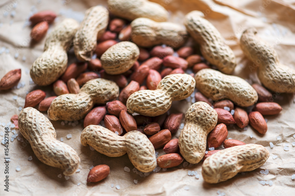 Salted peanuts on a paper bag