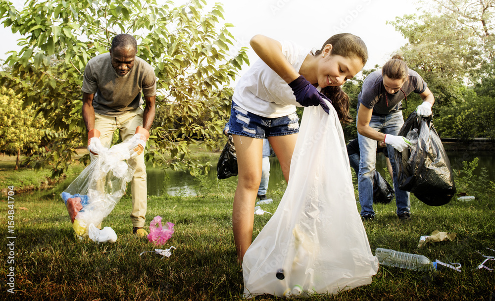 Ecology group of people cleaning the park