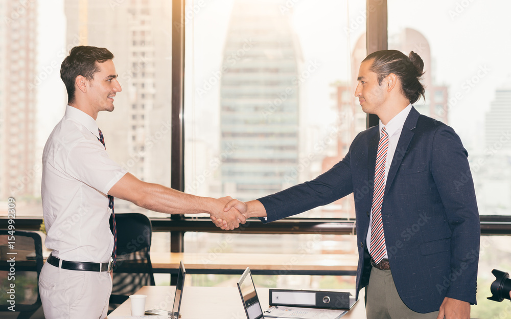 Handshake concept .Business people shaking hands, finishing up a meeting