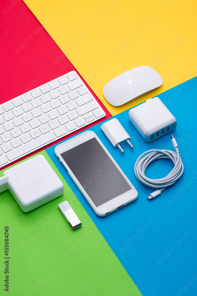 Well organised white office objects on colorful background