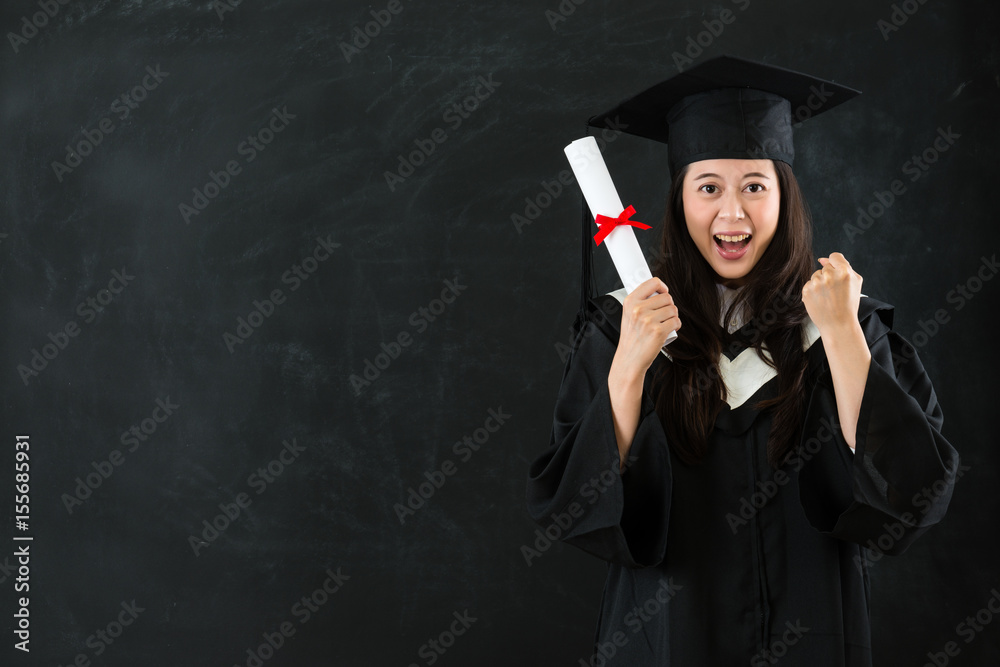 graduating student gesturing fist cheerful