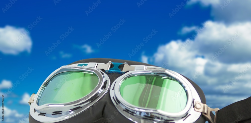 Composite image of aviator goggles on white background