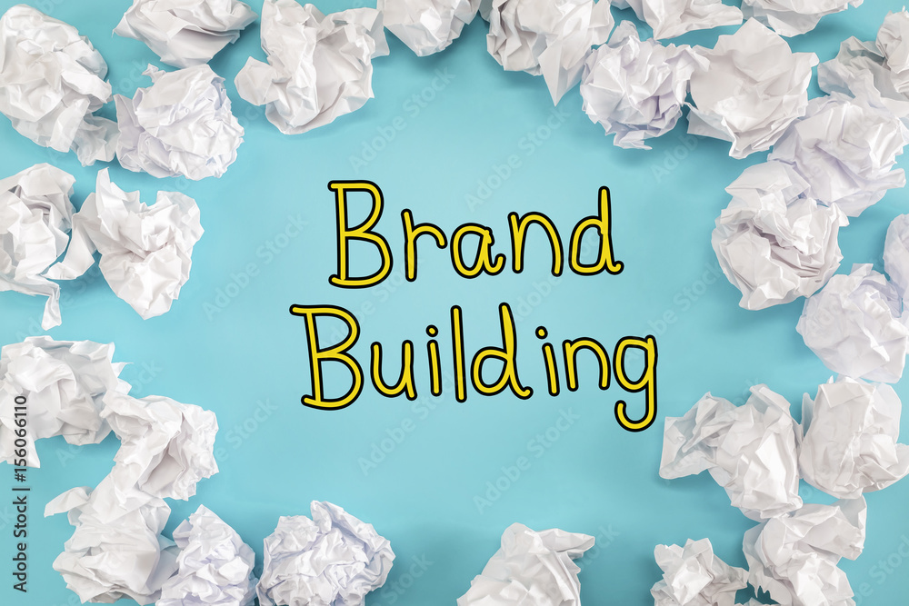 Brand Building text with crumpled paper balls