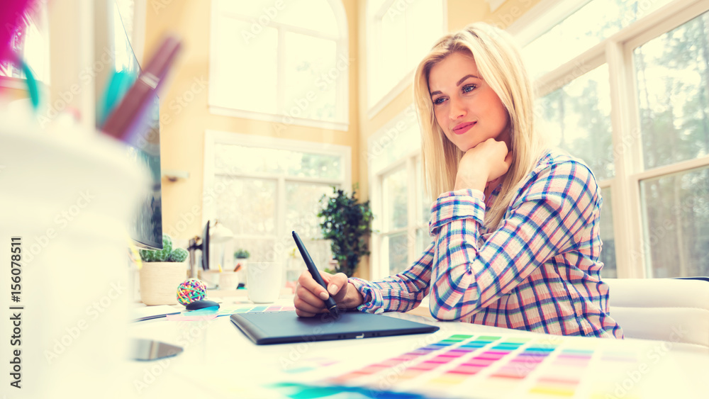 Graphic designer using her graphic tablet