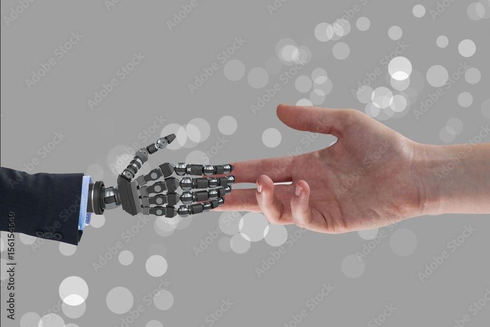 Human and robot handing their hands in grey background