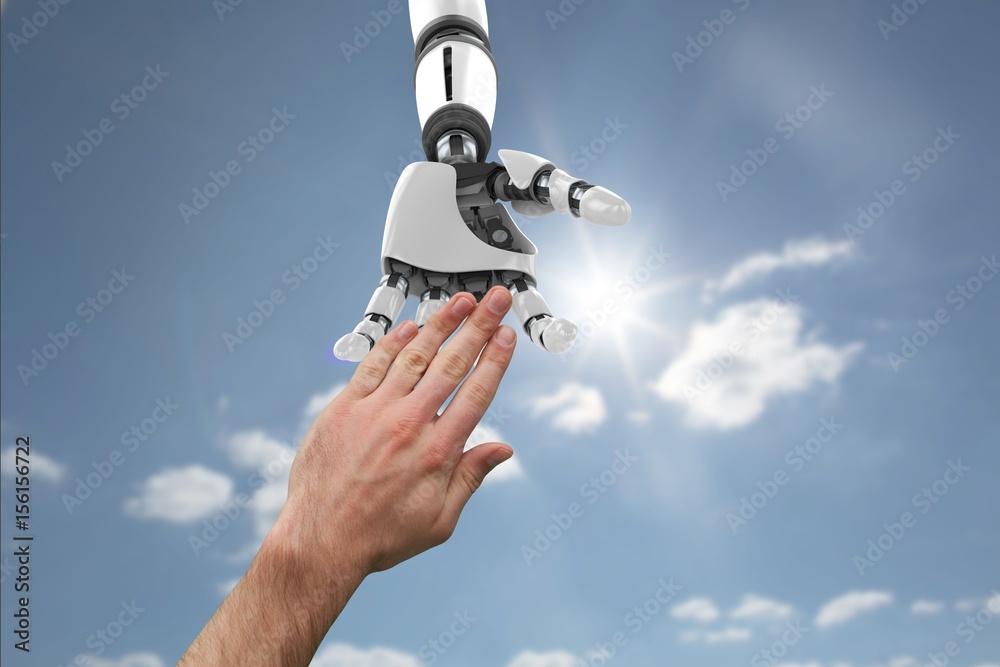 Human and robot touching their hands in blue background