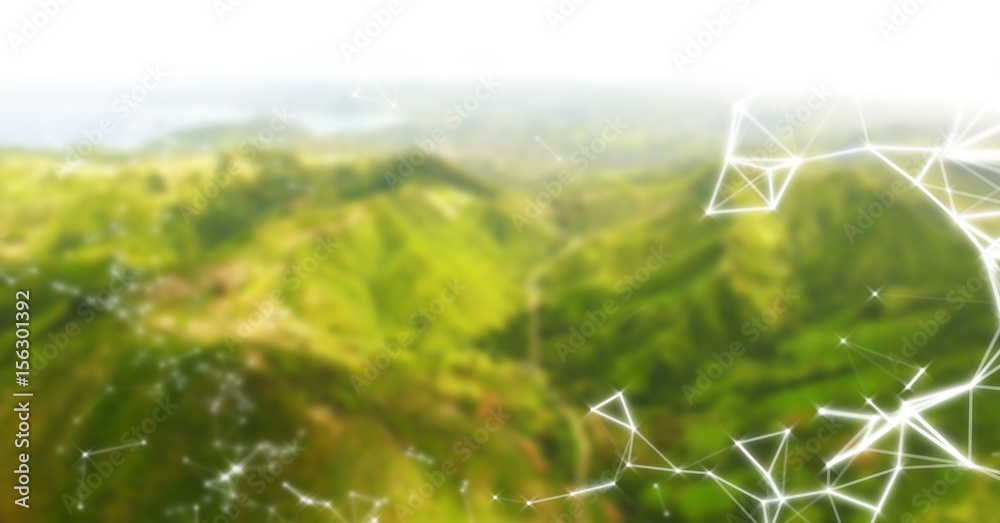 White network against green blurry mountains