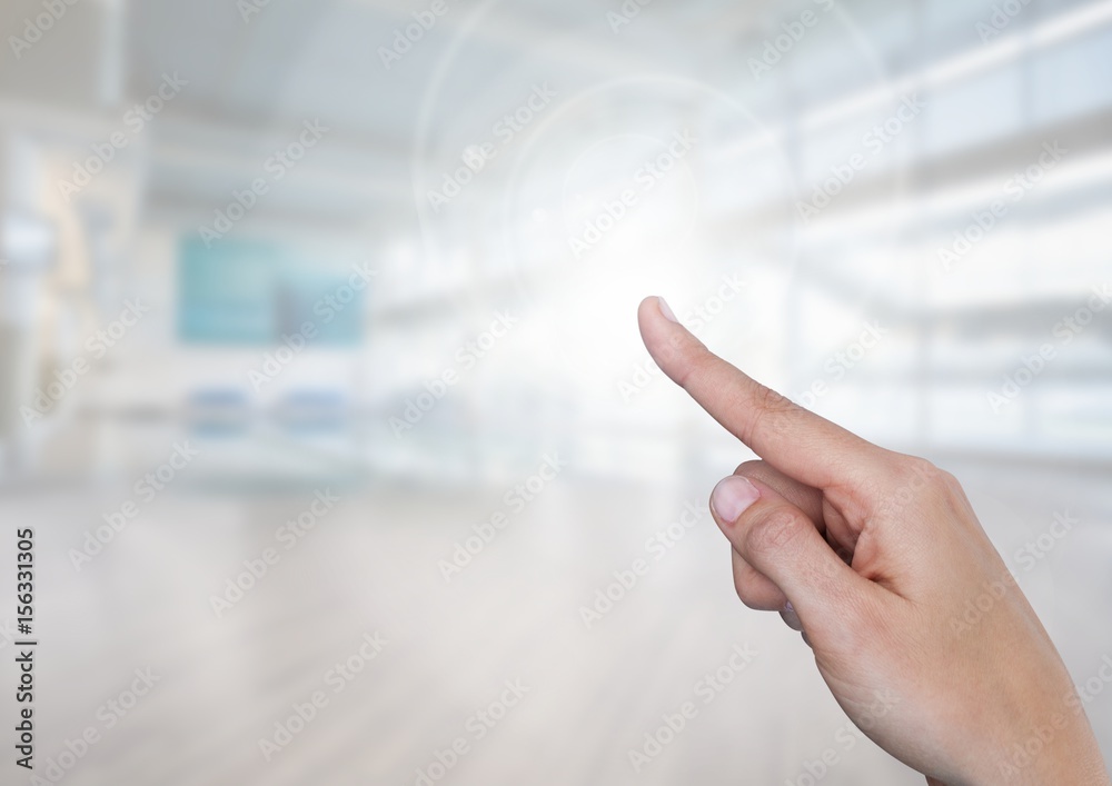 Hand touching air in bright gym sports hall