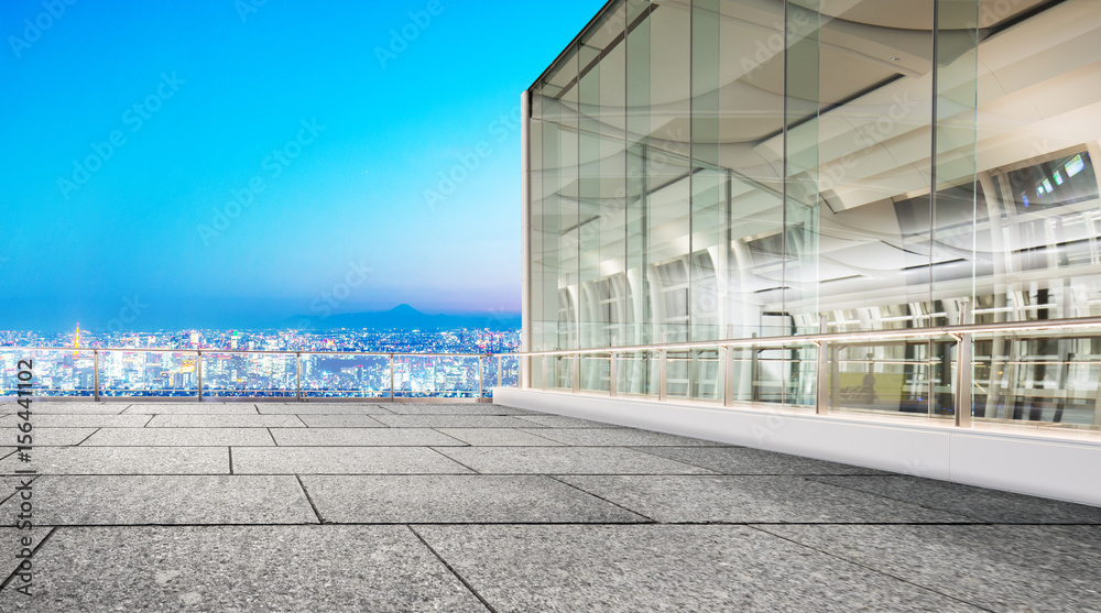 empty floor with cityscape of modern city