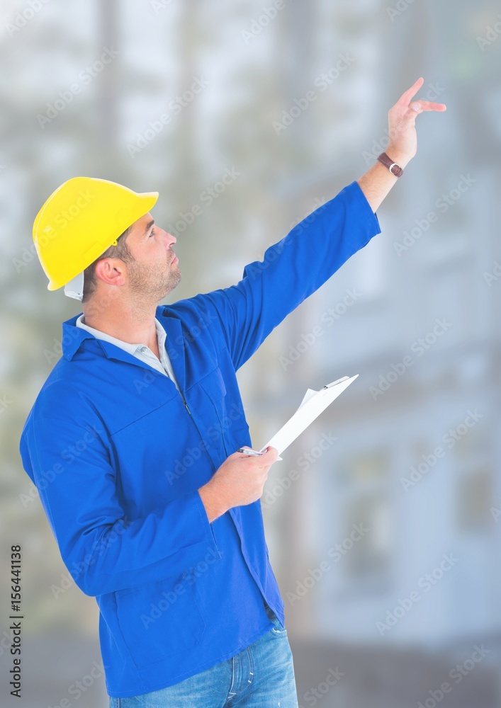 Construction Worker in front of forestry construction site