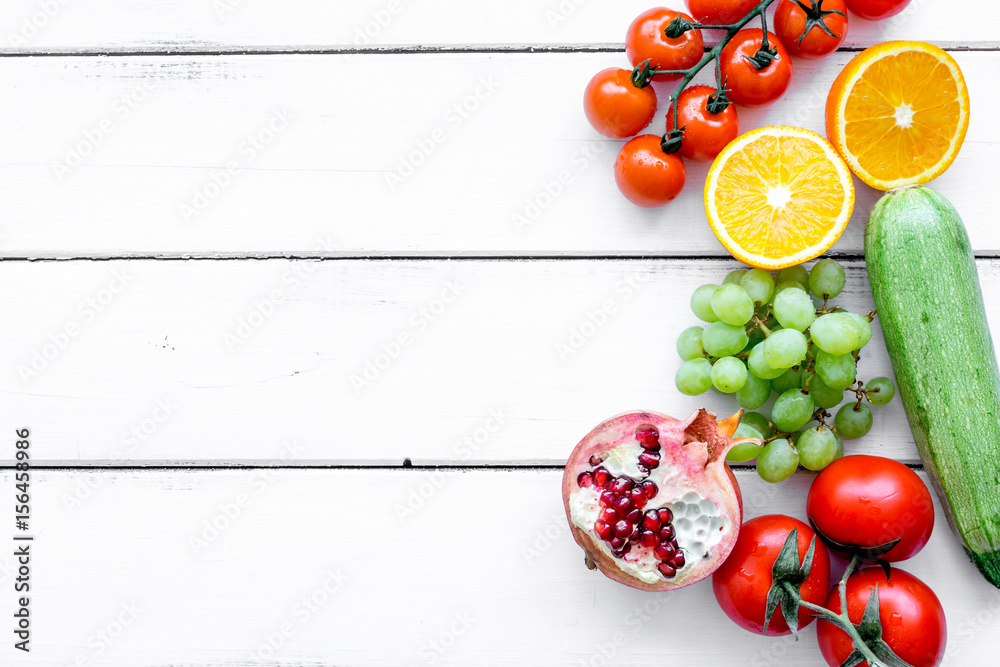 fresh vegetables and fruits for fitness dinner on white background top view mockup