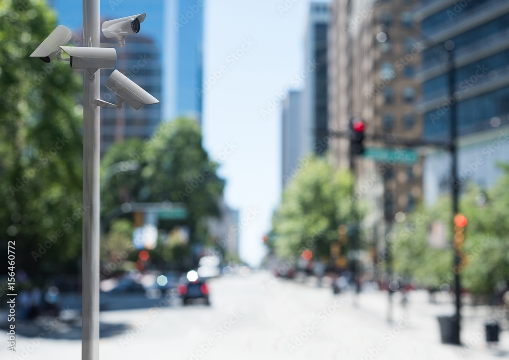 CCTV cameras on road in city