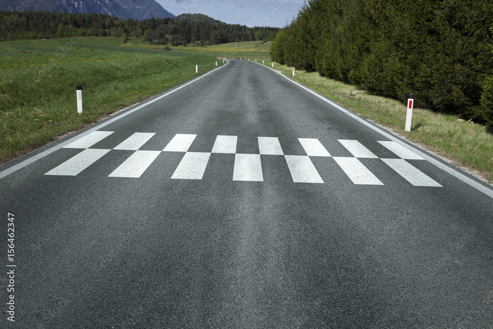 Start line pattern painted on the countryside asphalt road ground.