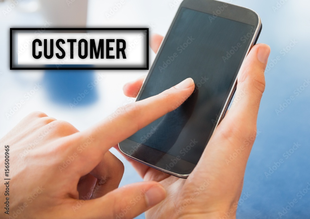 Hands holding smart phone with customer text