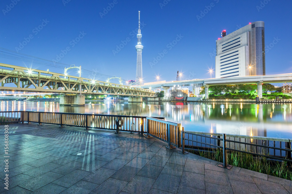 empty floor with cityscape of tokyo at night