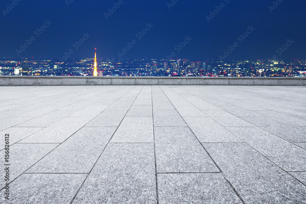 empty floor with cityscape of tokyo at night