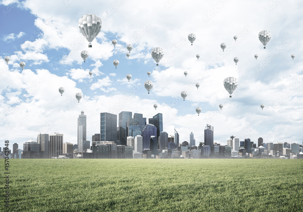 Concept of eco green life with aerostats flying above city