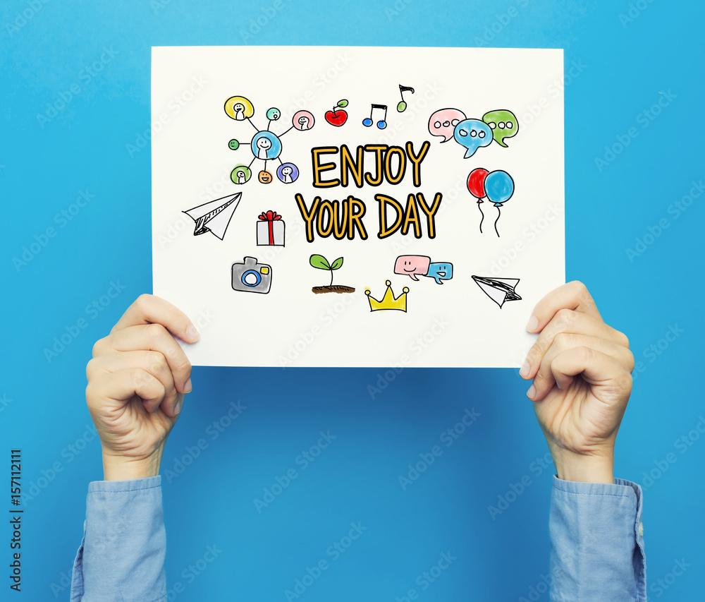 Enjoy Your Day text on a white poster