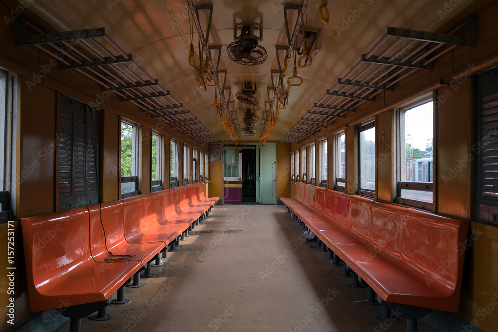 Old abandoned seats in old tram whole view