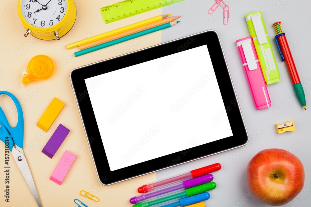 School and office supplies on tablet.