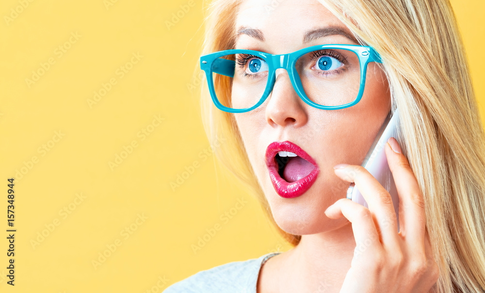 Young woman talking on the phone