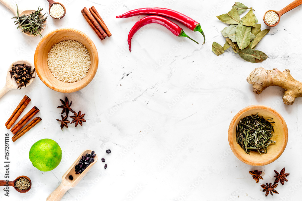 Dry colorful spices, chili pepper on kitchen stone table background top view mockup