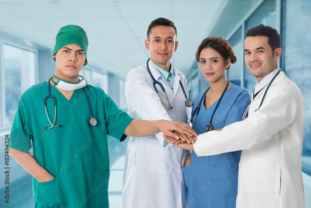 Doctors group, surgeon and nurse on hospital background