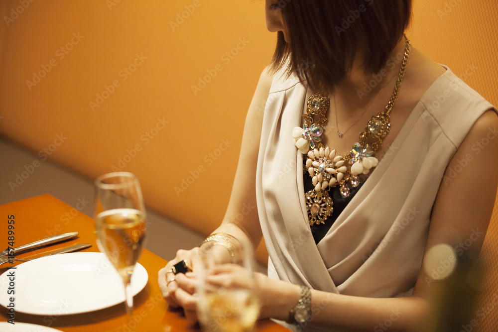 A lady looking down at a restaurant