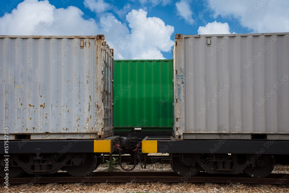 train with container on blue sky.